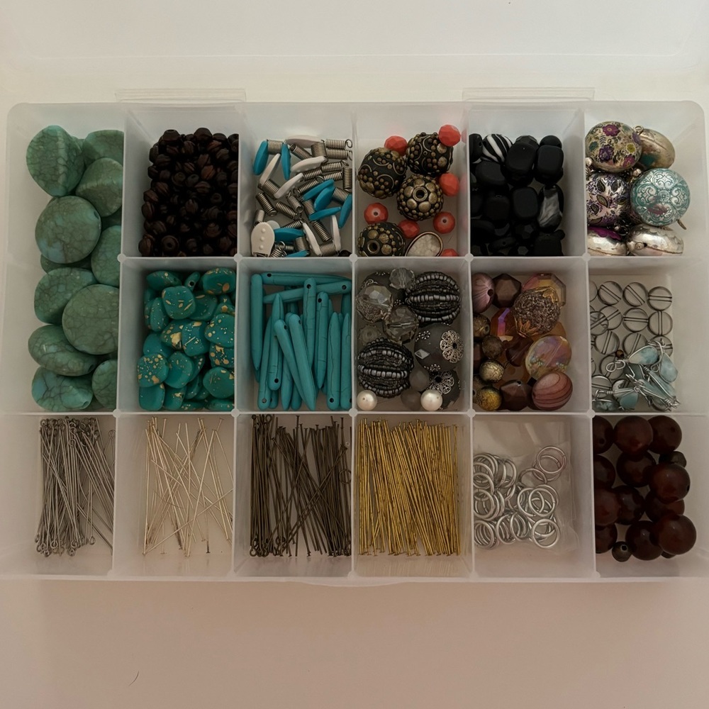 Various beads and jewelry making supplies